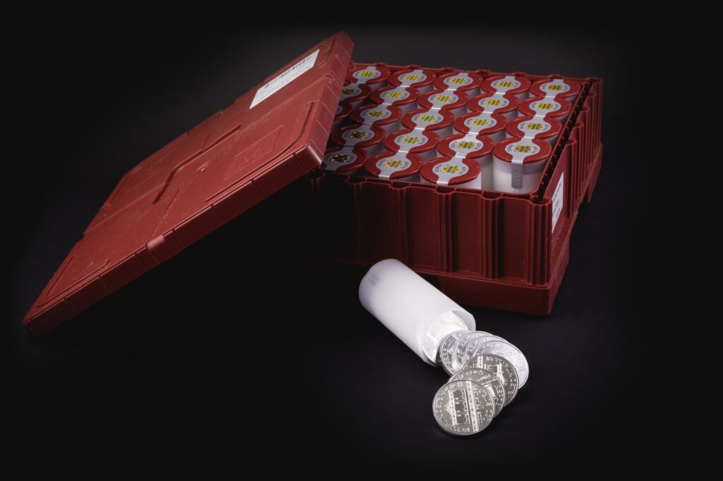 Vienna Philharmonic coins set out in tubes in a masterbox