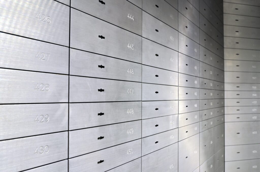 An image of locked safe deposit boxes