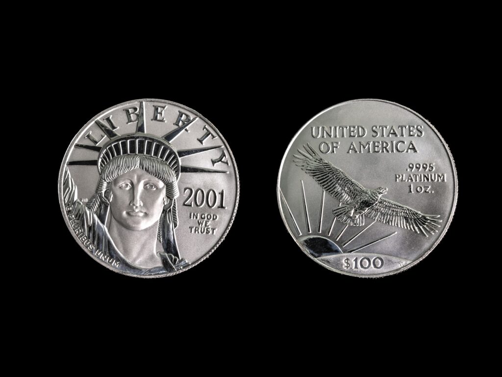 Front and back of a Platinum Eagle coin