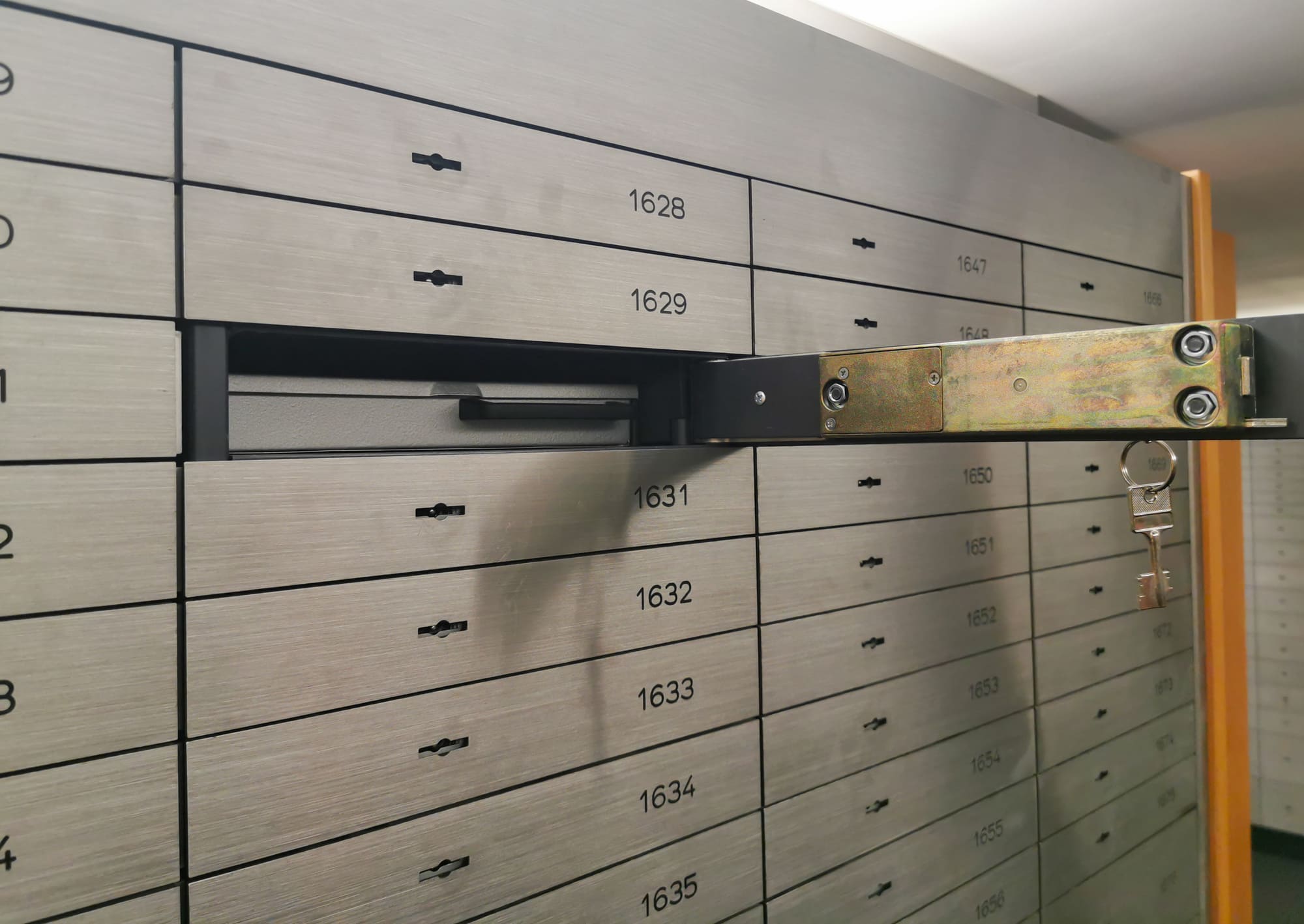 Opened safe deposit box in a vault