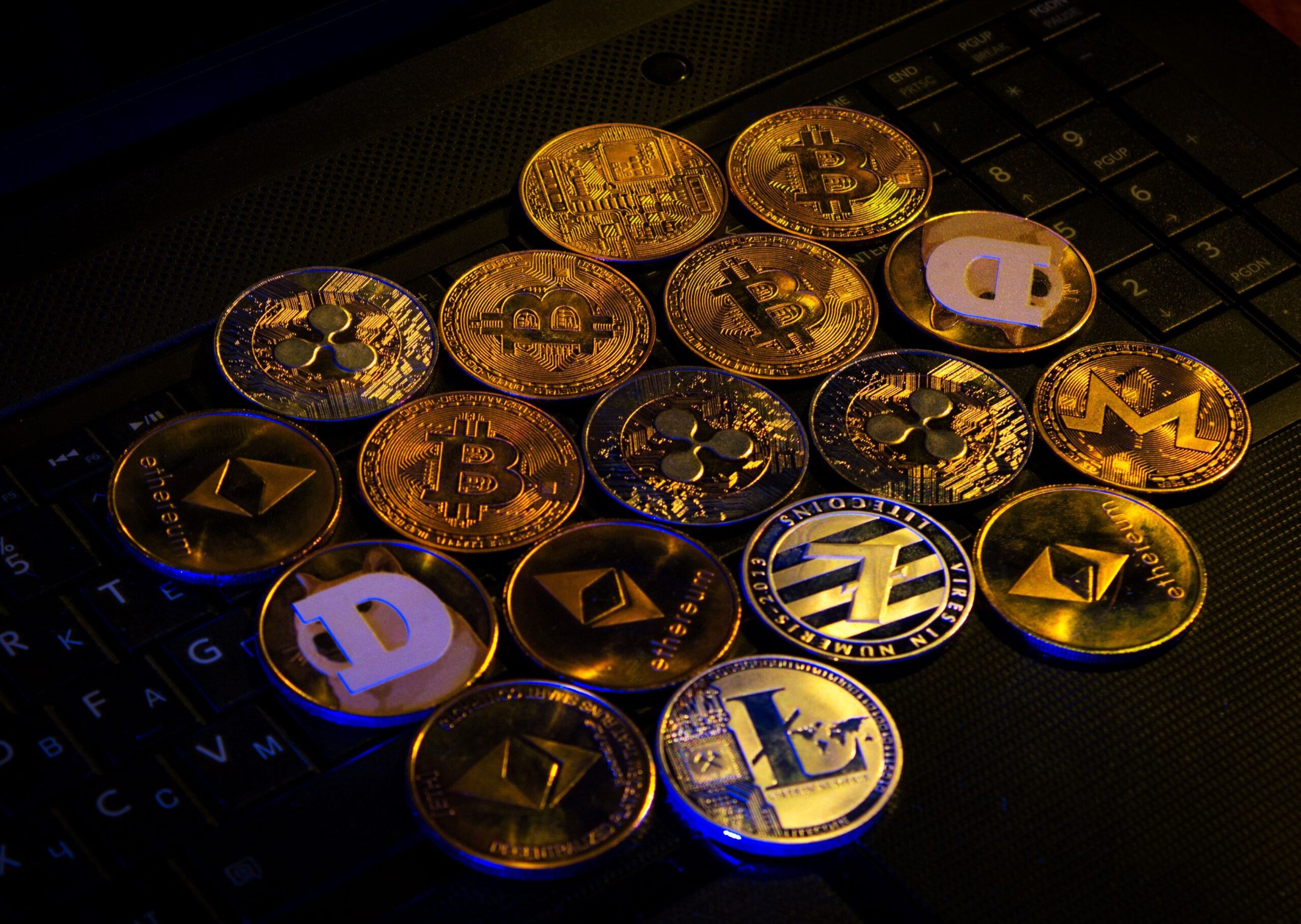 Various cryptocurrencies represented as gold coins