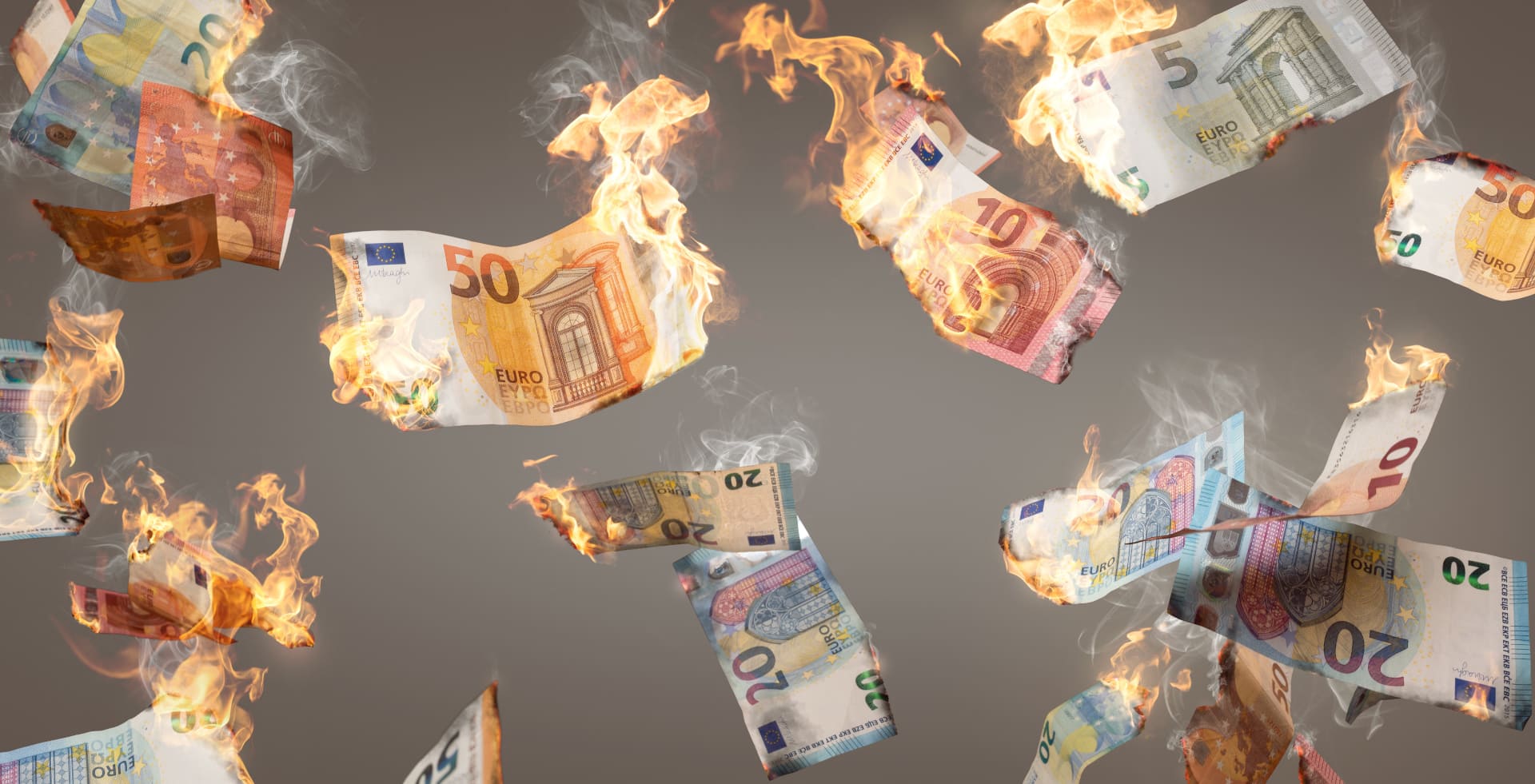 Various burning euro notes fall down