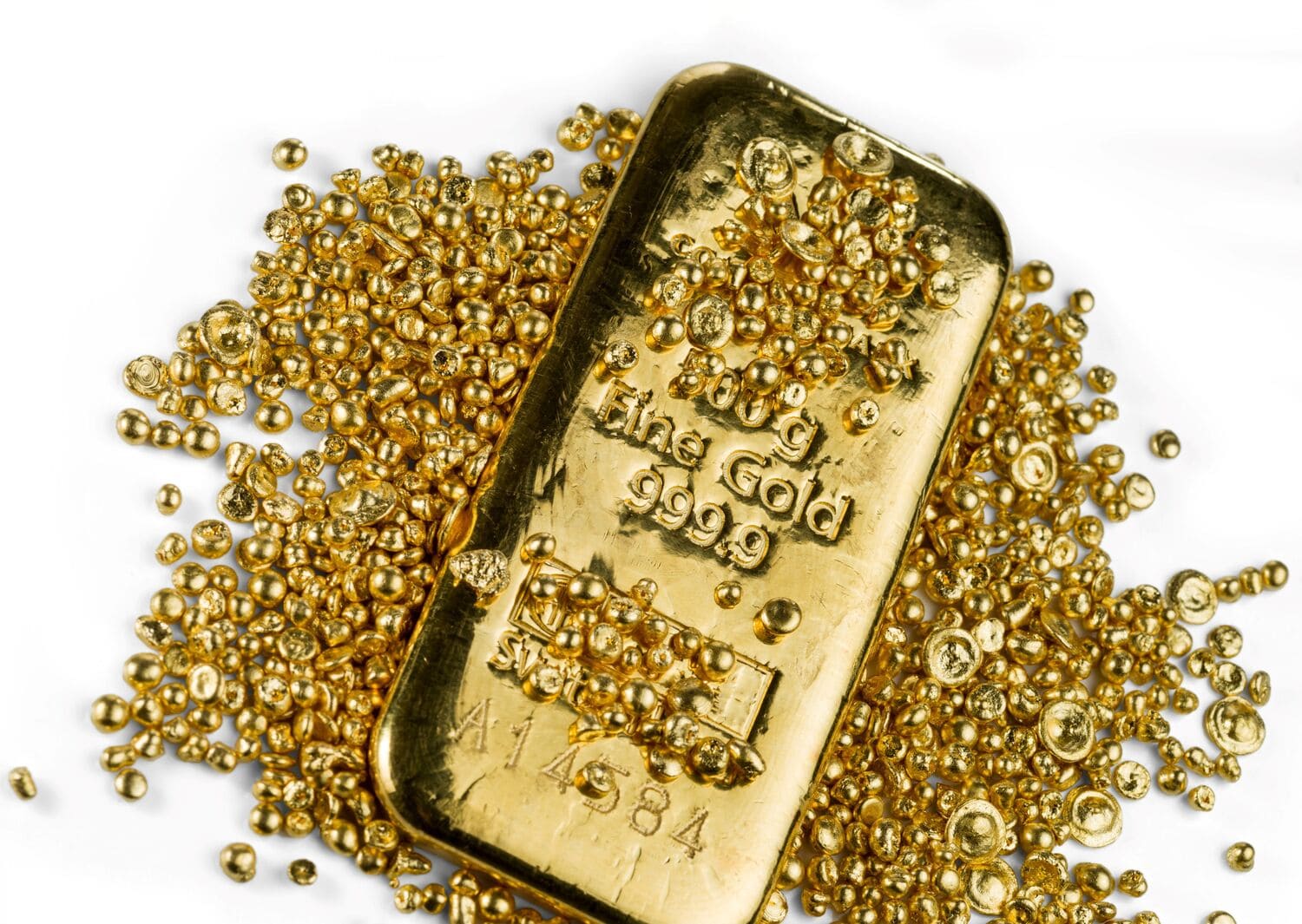 Gold bars surrounded by gold granulate